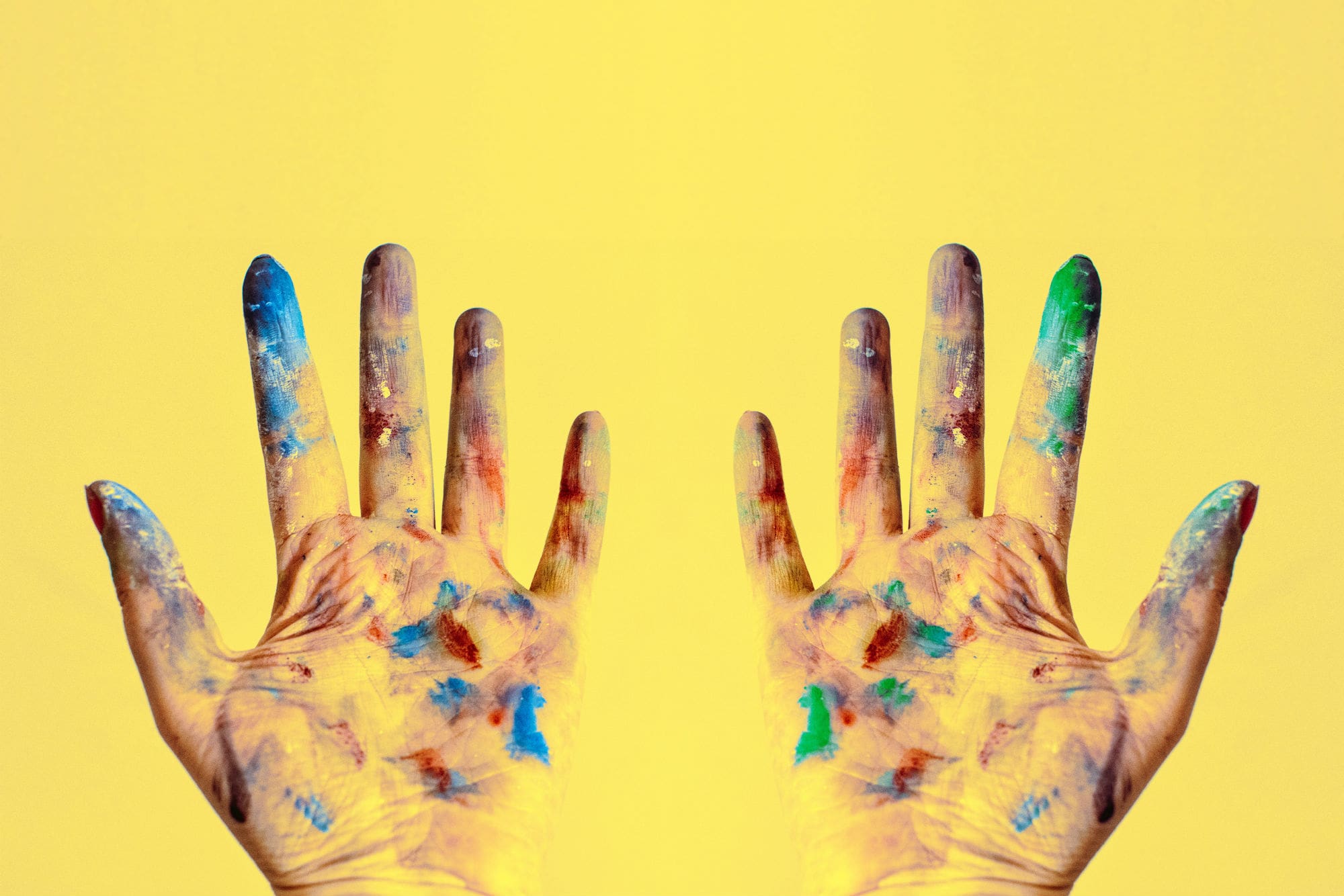 hands with paint