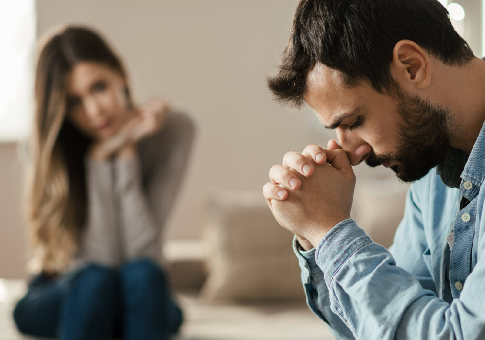 Man and woman sitting together in conversation