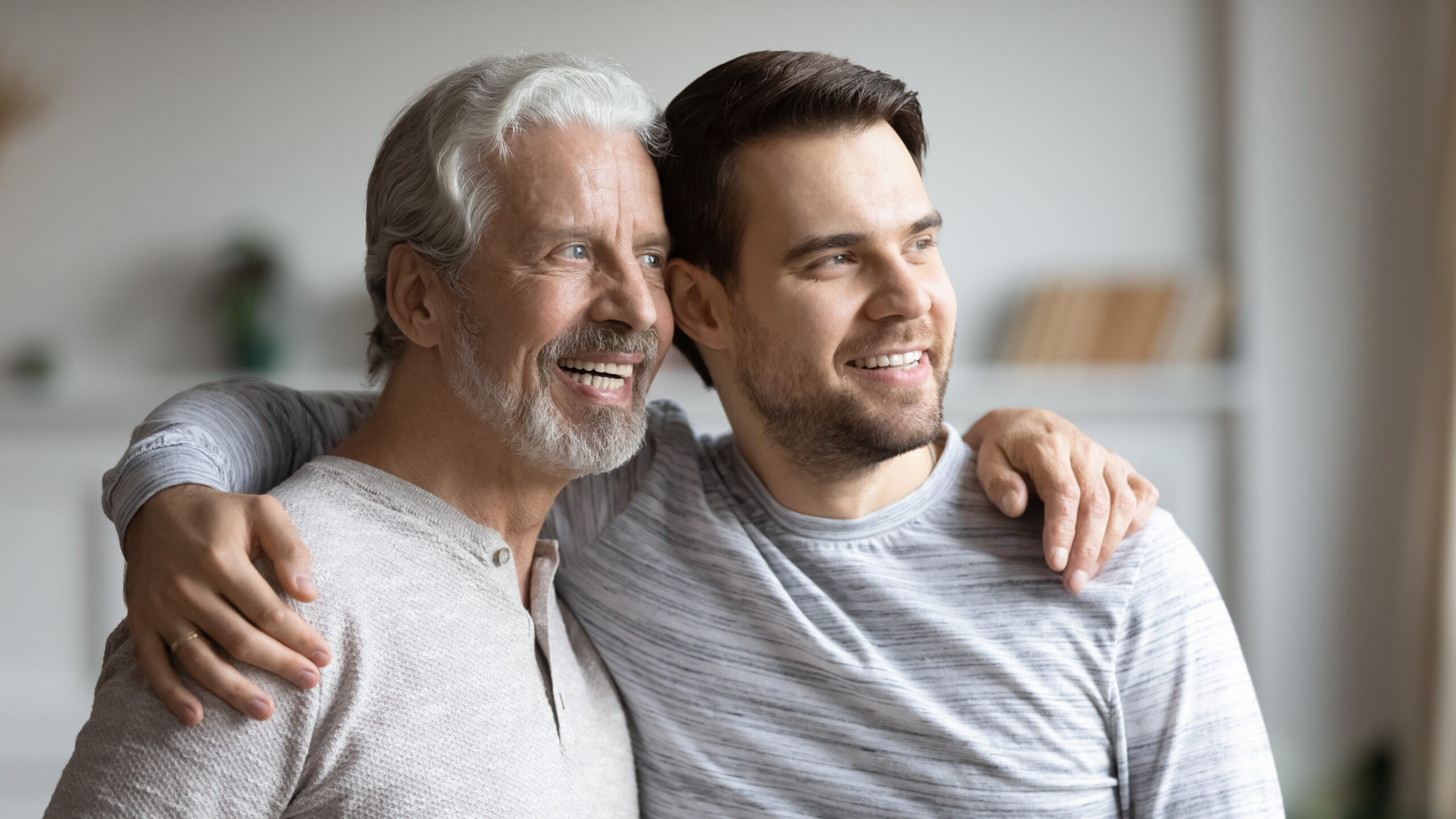 dad and son hugging