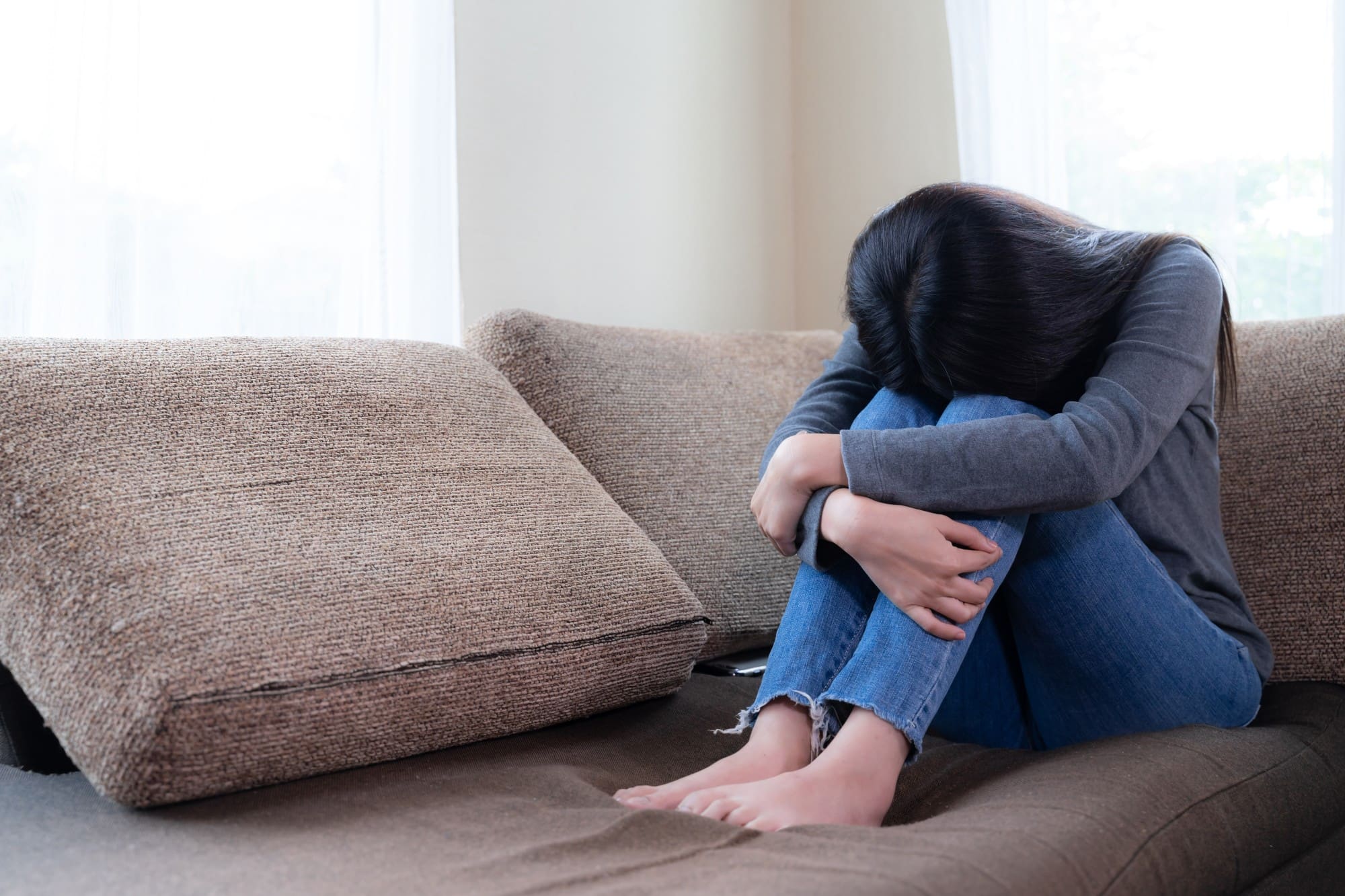 young woman on couch