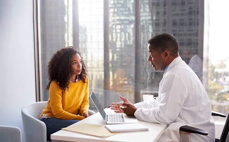 Doctor having a discussion with his patient