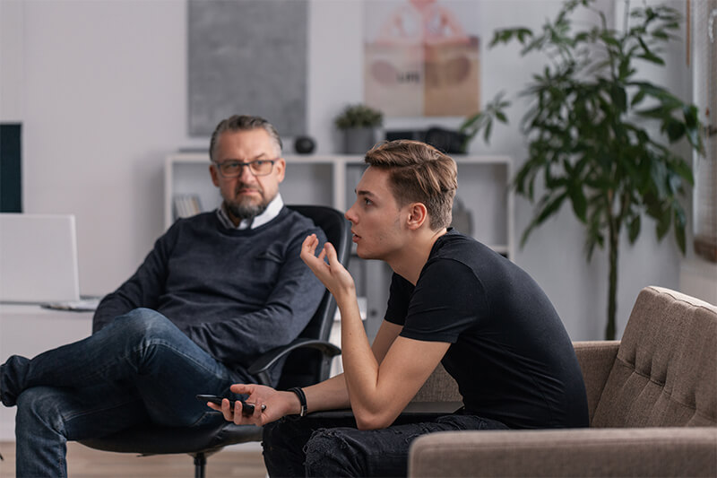 Teenager having a meeting with a therapist