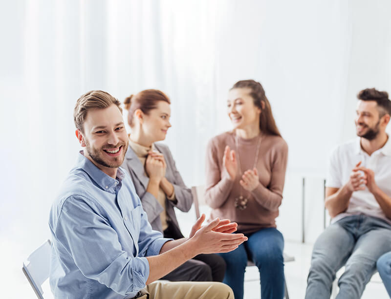 Group session applauding after a member spoke