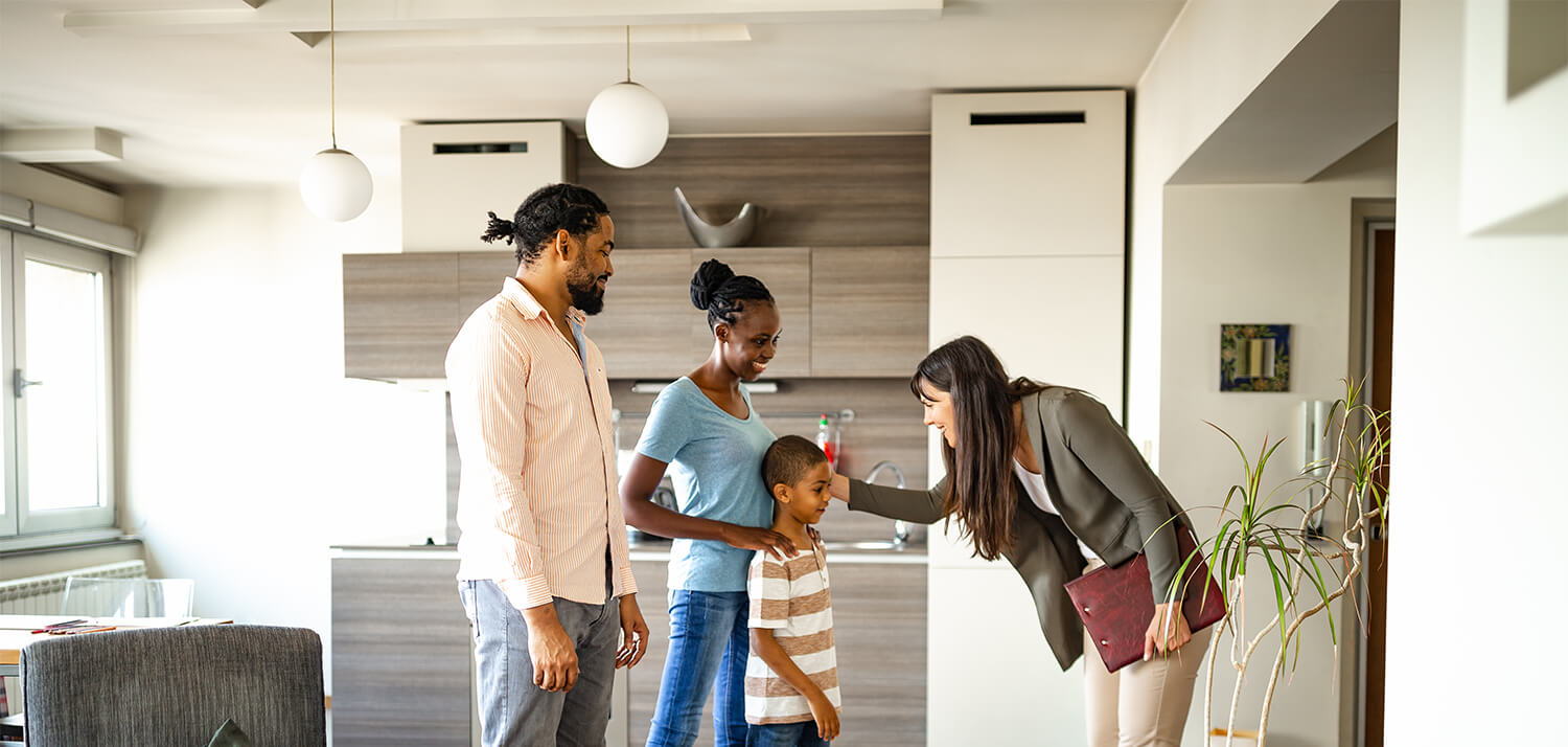 Family counselor greeting family