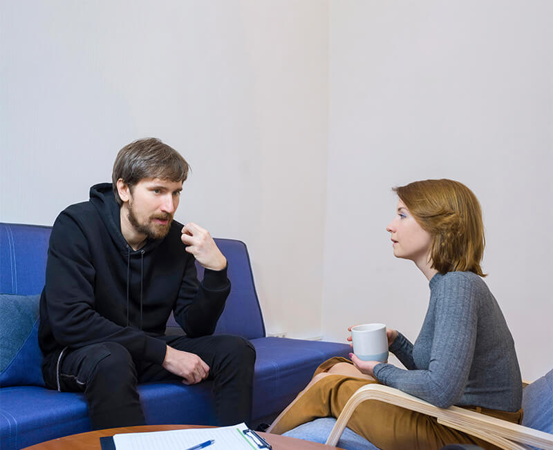 Man and therapist having a one on one meeting