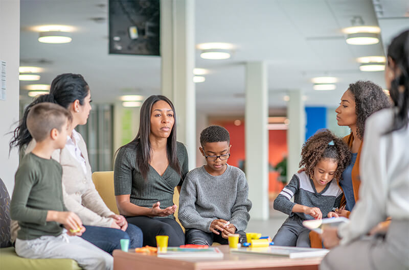 Multiple family groups in a therapy session