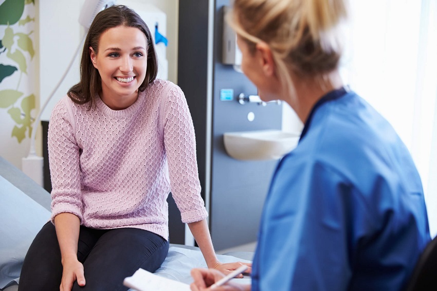 woman speaking to a therapist