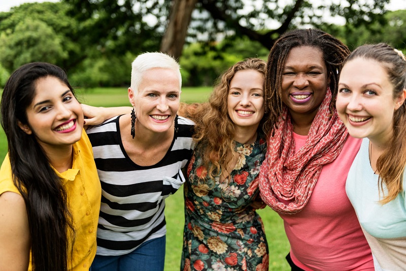 group of women smiling for a picture