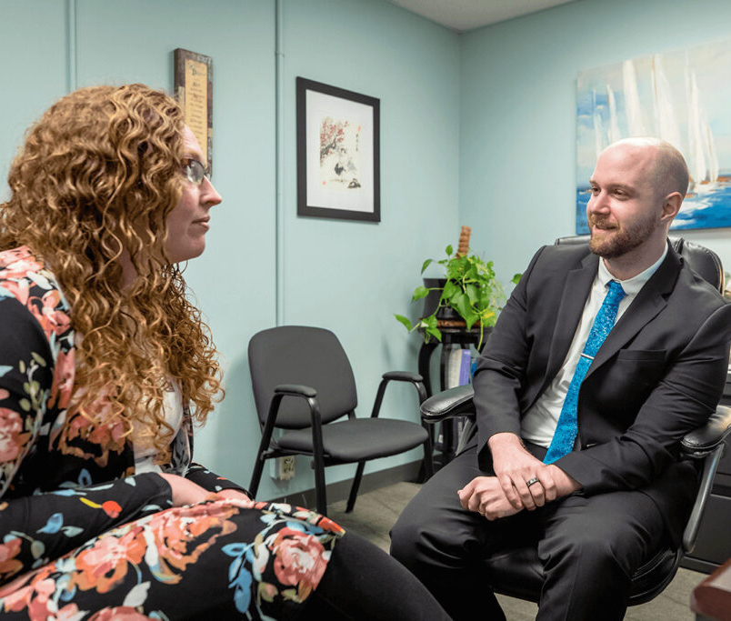 Doctor talking with patient