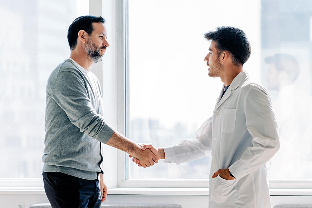 Man and Doctor shaking hands
