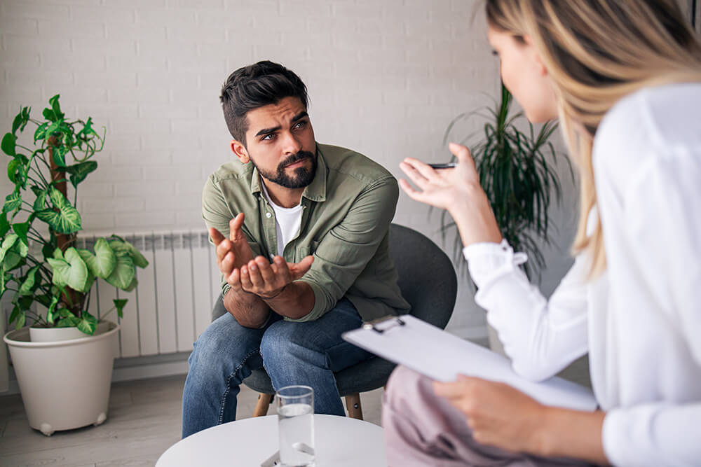 Man talking to a counselor