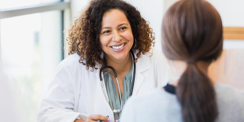 doctor talking to her patient