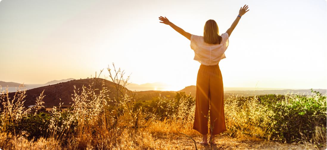 woman standing in the sun