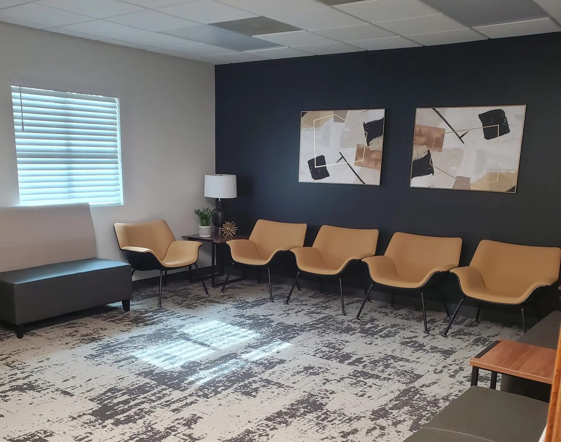 Lobby with modern seats against the wall
